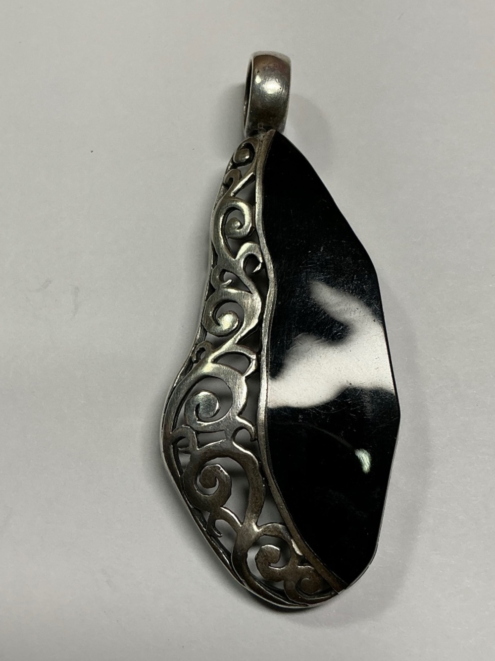Sterling Silver Balinese Style and Black Stone Pendant. 2.75 inches long